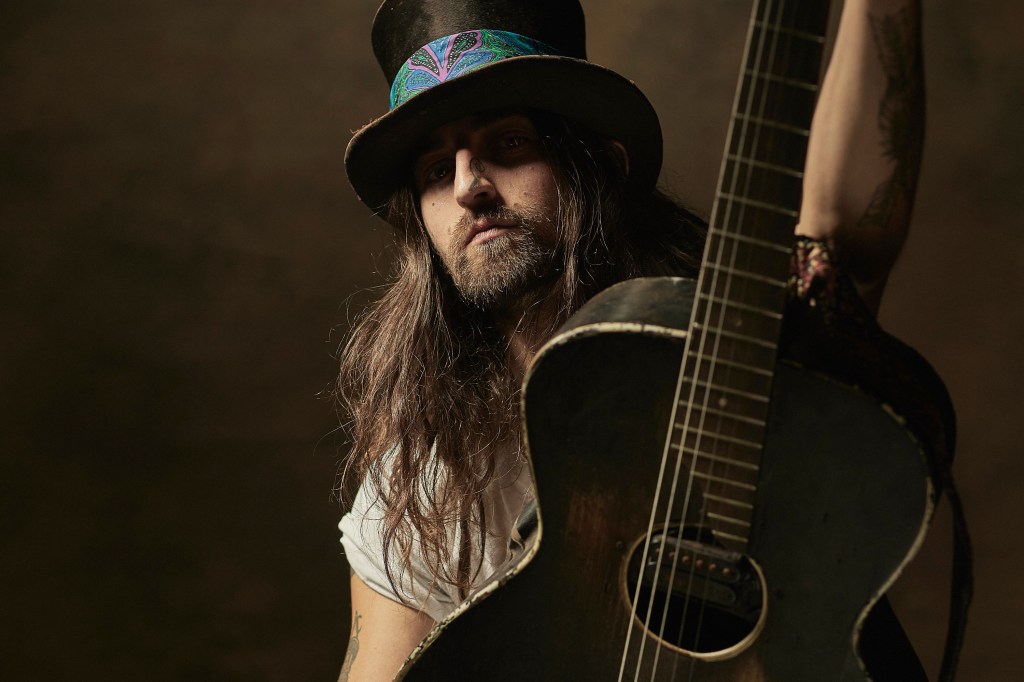 Cam Cole - Holding Guitar - Fox Reviews Rock -Jon Ciotti