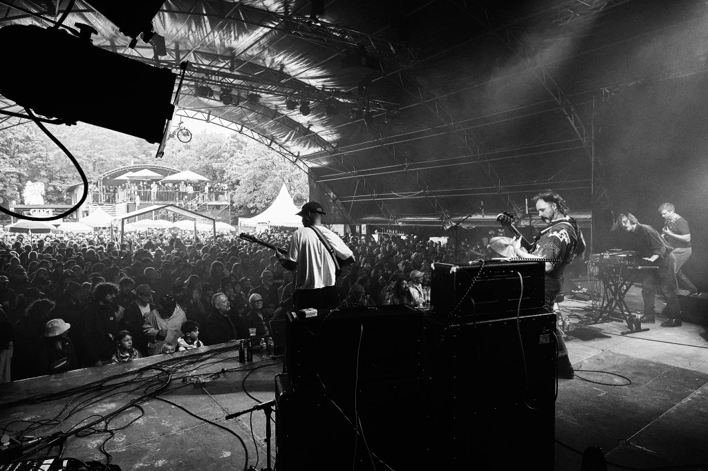 Fomies performing live on stage during their European tour