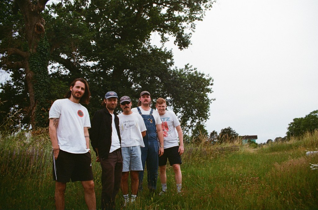 Fomies band members posing together during an interview feature
